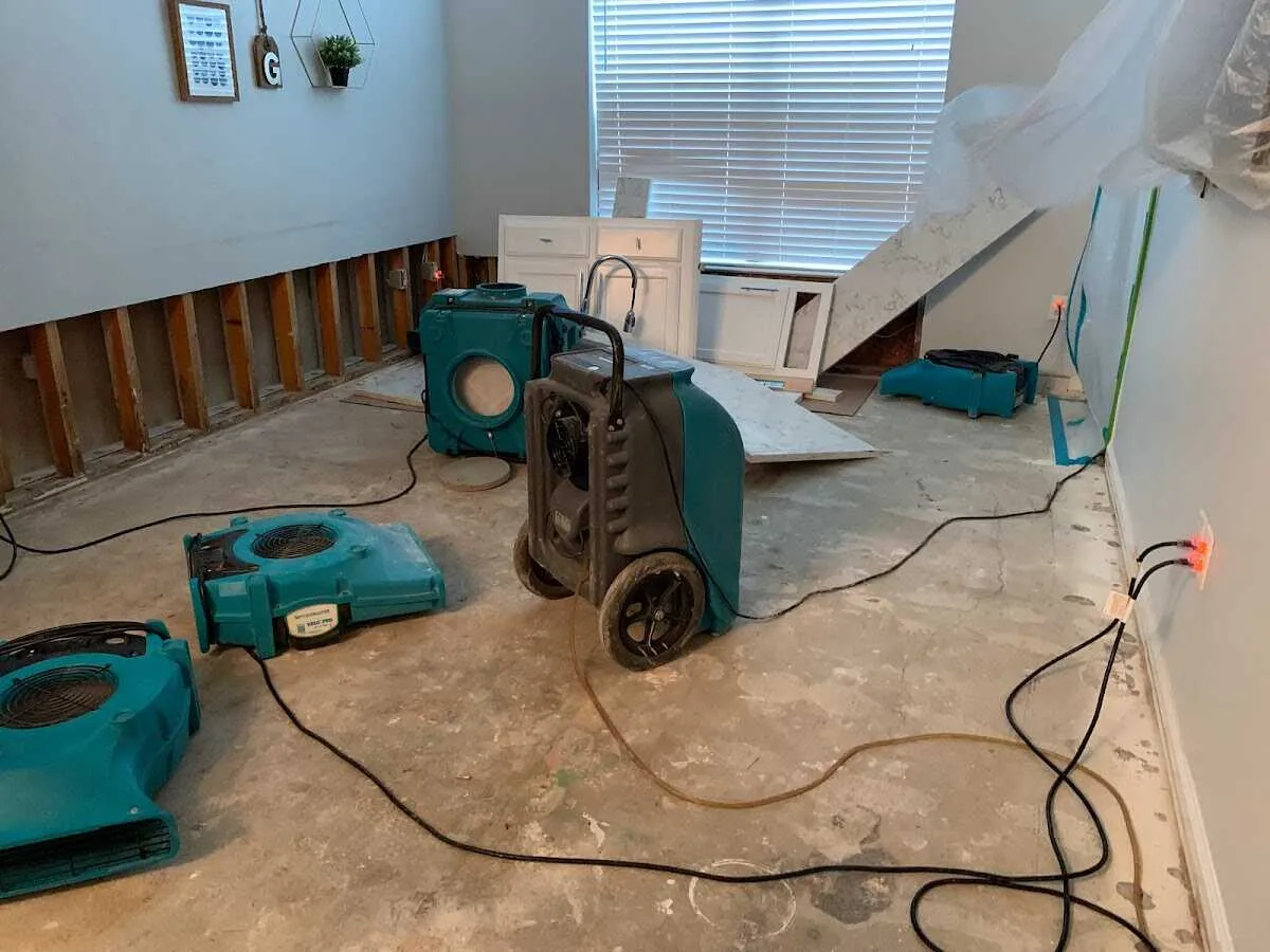 Dehumidifier in flood-cut room for Water Damage Restoration in St. Stephens